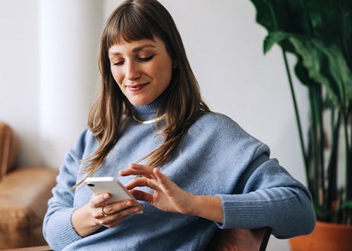 Crossover Member utilizing virtual care on her phone