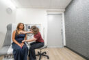 Member receiving Primary care in a St. Louis exam room